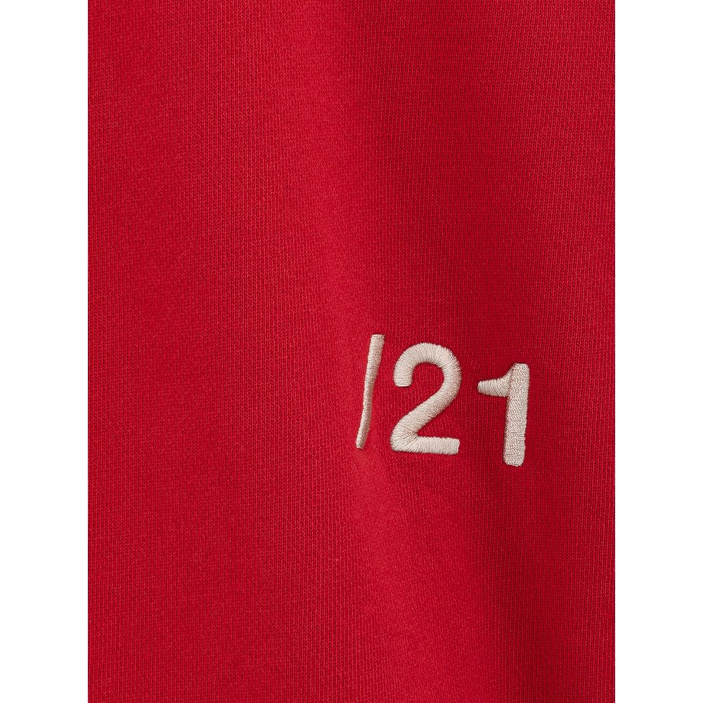 Red jersey with white number 121 on sleeve