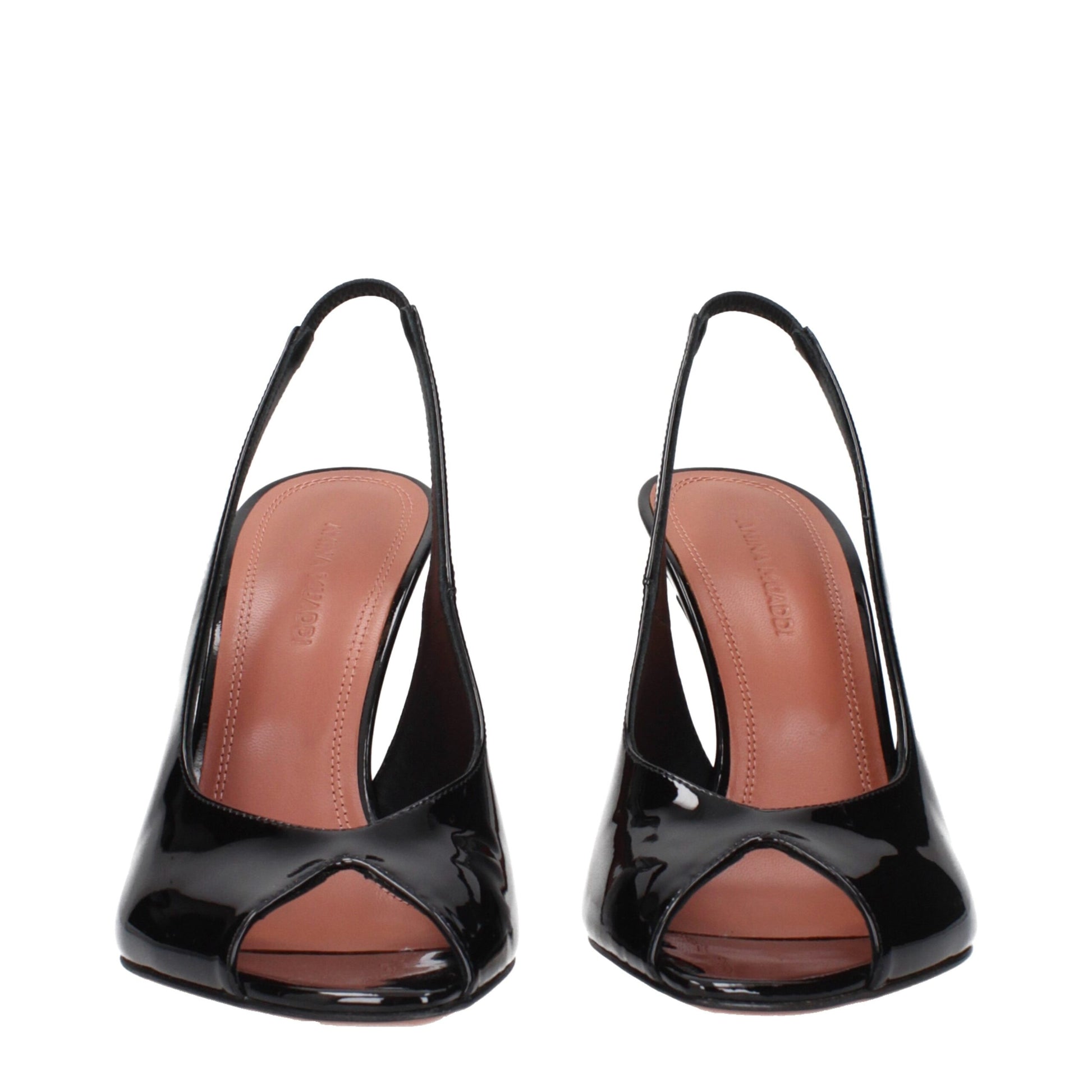 Pair of black high heel shoes with brown straps