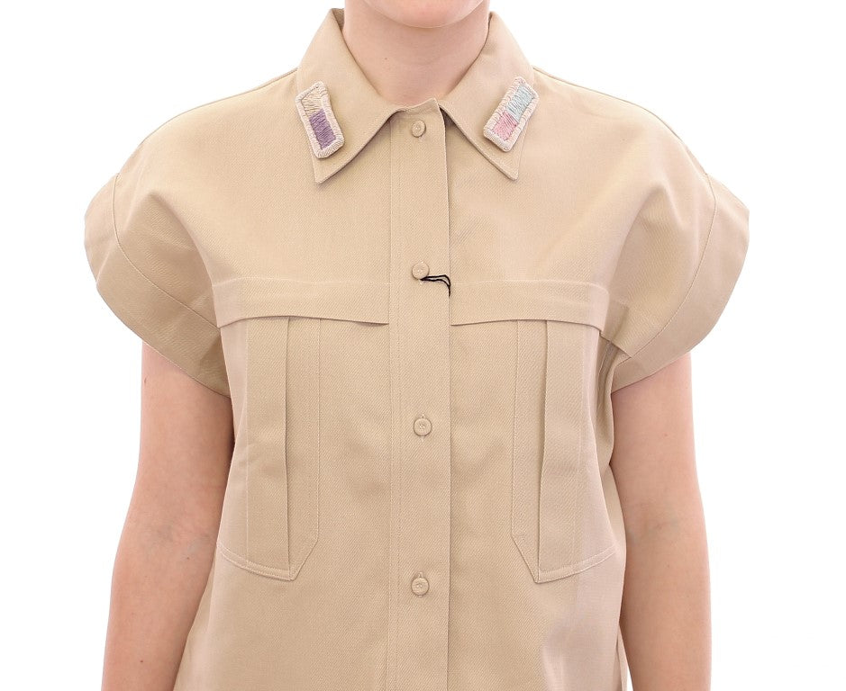Tan short sleeve shirt with buttons and pockets