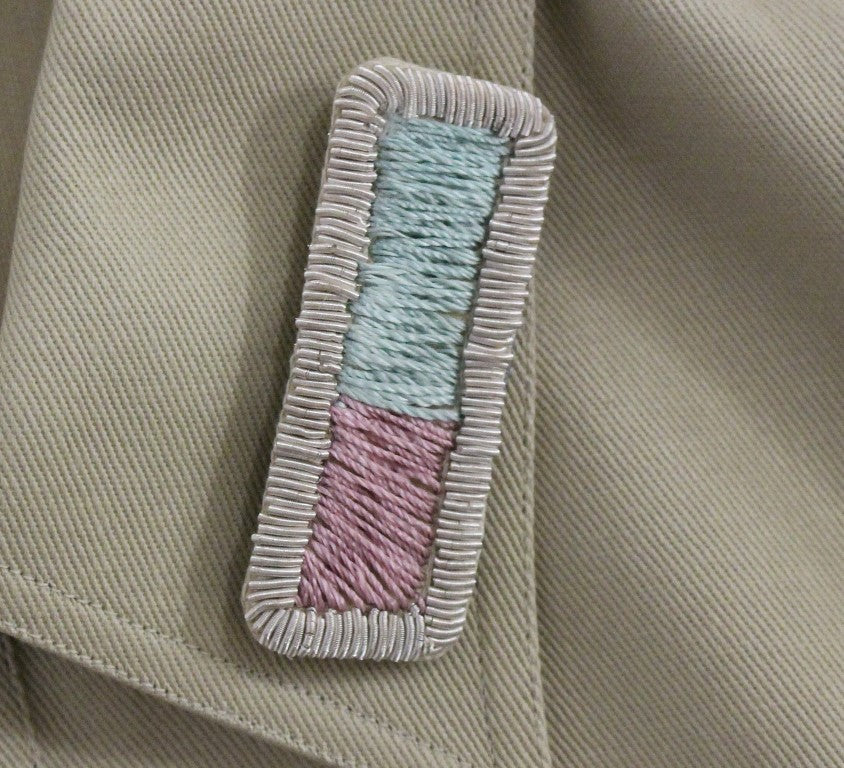 Embroidered patch on fabric