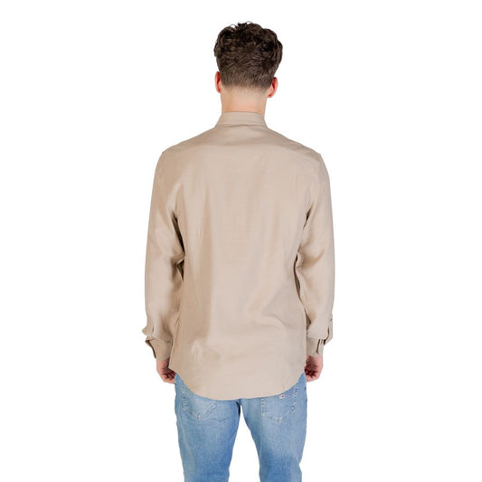 A beige viscose dress shirt with long sleeves
