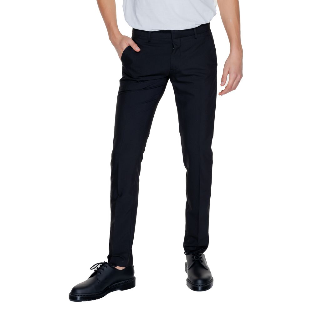 A pair of black polyester dress pants with a slim fit