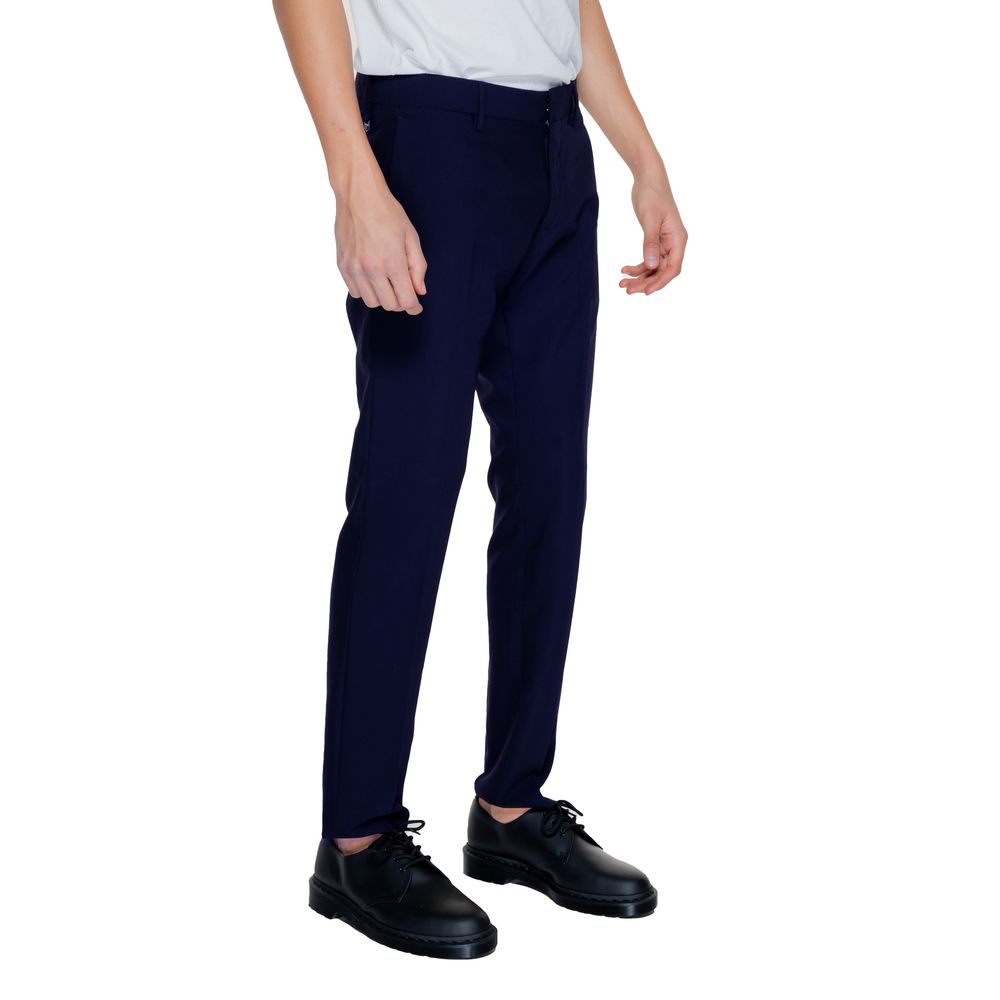A pair of blue dress pants with a slim fit, made from polyester fabric