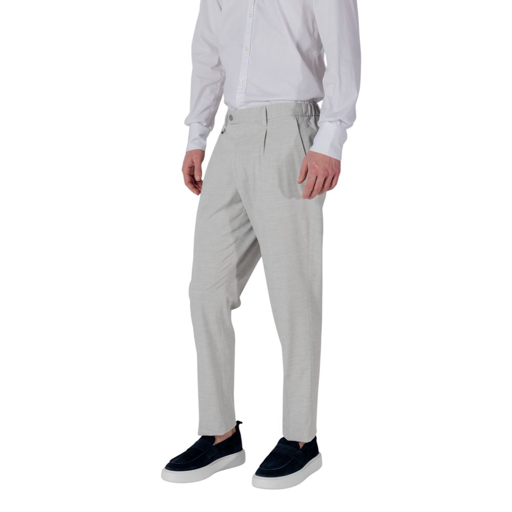 A pair of gray polyester dress pants from the brand Antony Morato. They are designed with a slim fit and feat