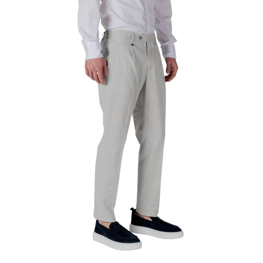 A pair of gray polyester dress pants from the brand Antony Morato. They are designed with a slim fit and feat