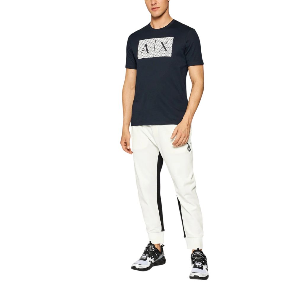 A blue cotton t-shirt with a graphic print on the front, worn by a mannequin or model