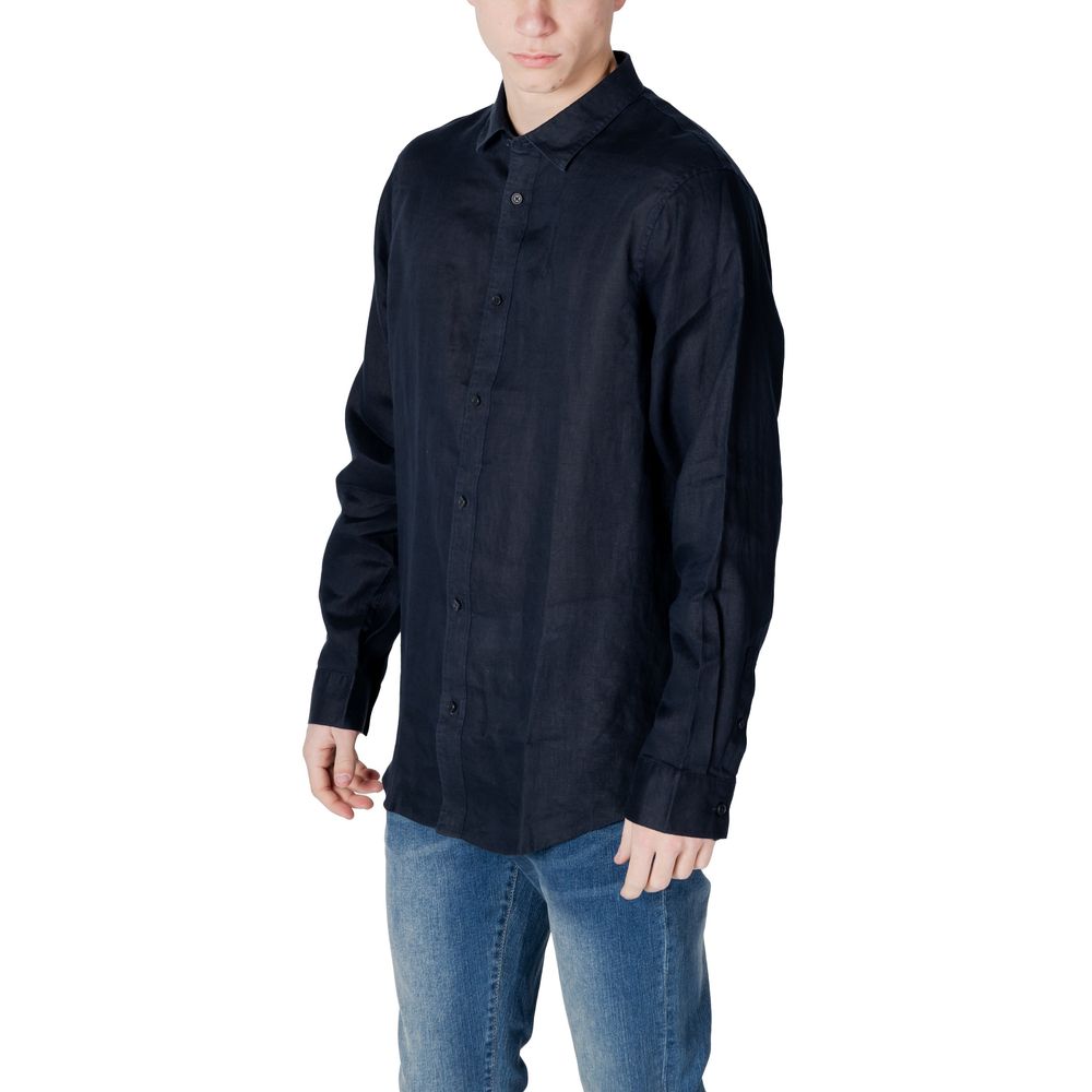 A long sleeve blue linen dress shirt with a button-up front