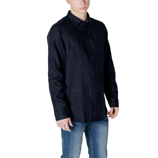A long sleeve blue linen dress shirt with a button-up front
