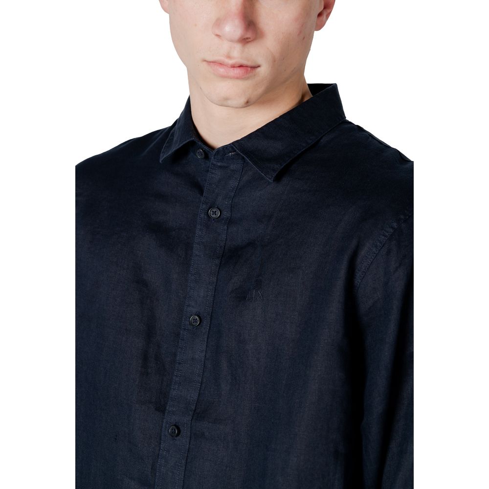 A blue linen dress shirt with a collar, long sleeves, and buttoned front