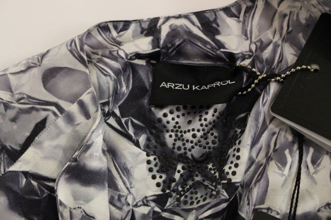 The jacket is black and white with a patterned design