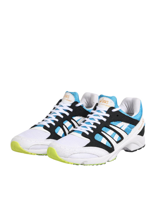 Pair of white sneakers with blue accents