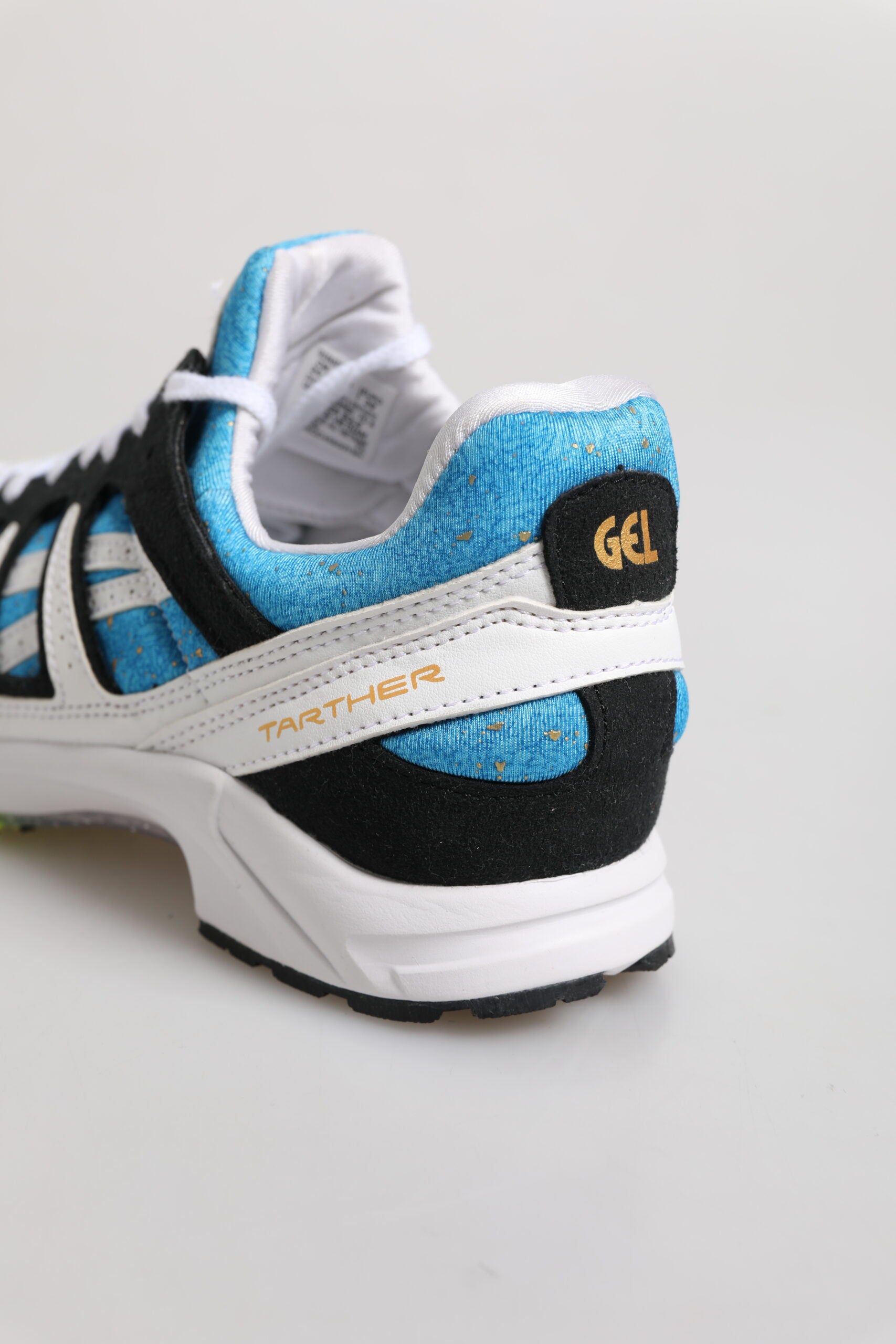 Blue and white athletic shoe
