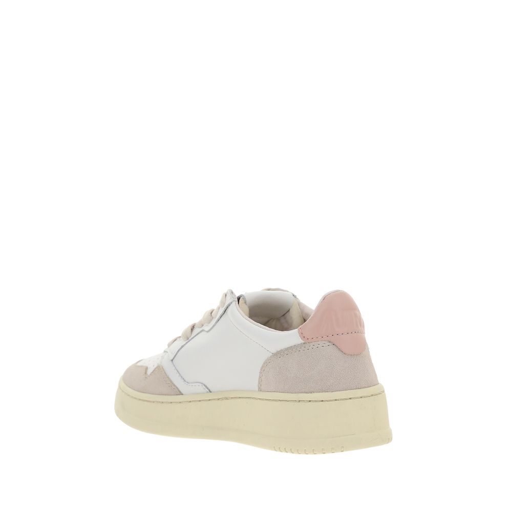 Pink and white baby shoe