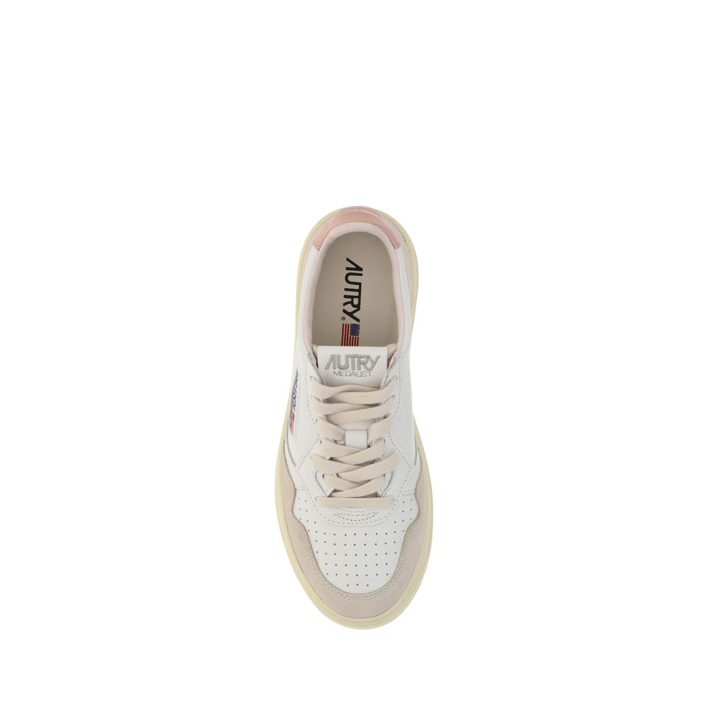 Pink sneaker with white sole