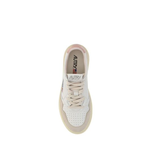 Pink sneaker with white sole