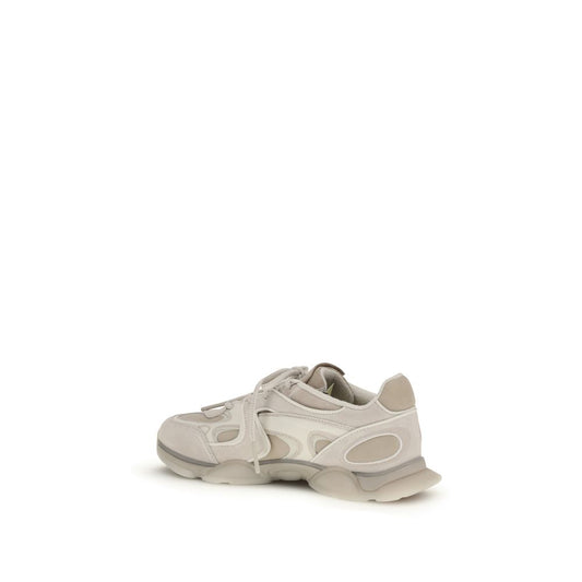 A pair of white chunky sneakers with a calf leather upper and rubber sole