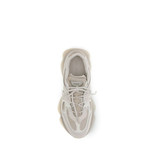 A pair of white chunky sneakers with a calf leather upper and laces