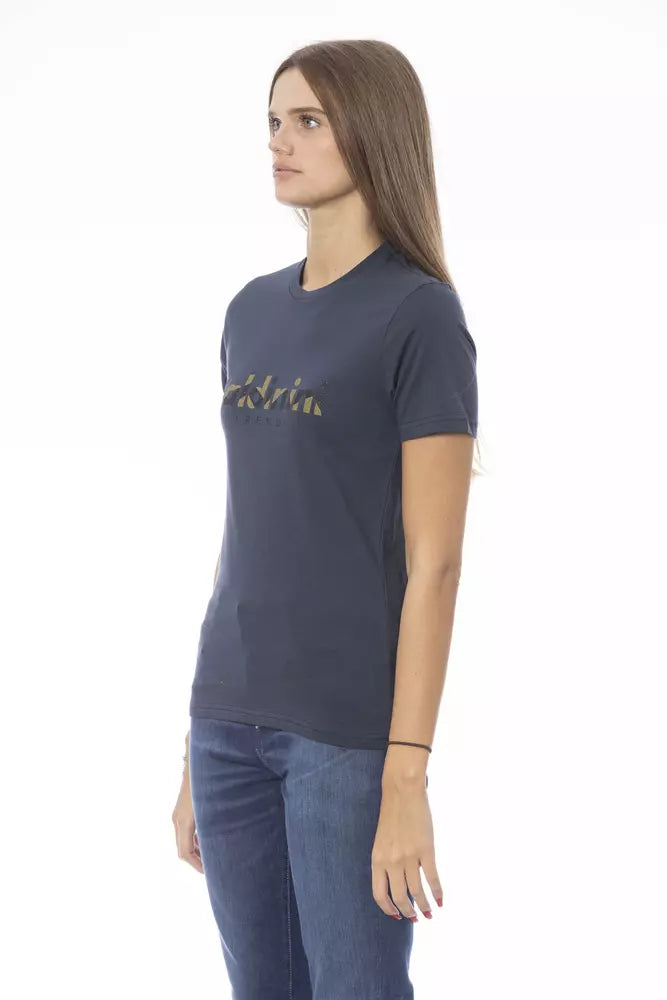 Woman wearing dark blue t-shirt with gold lettering