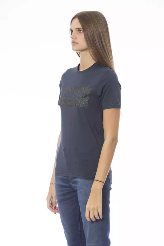 Woman wearing dark blue t-shirt with graphic design on front