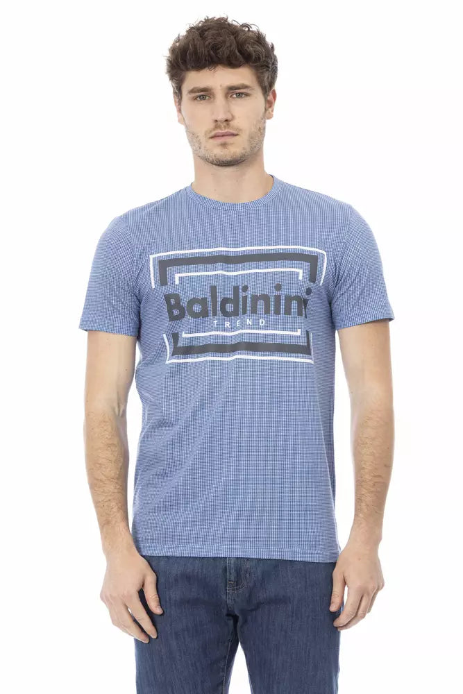 Man wearing blue shirt with white logo
