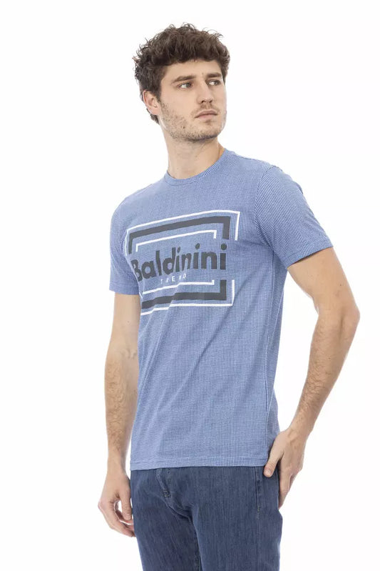 Man wearing blue shirt with white logo