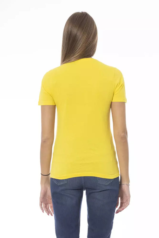 Yellow short sleeve shirt on a woman
