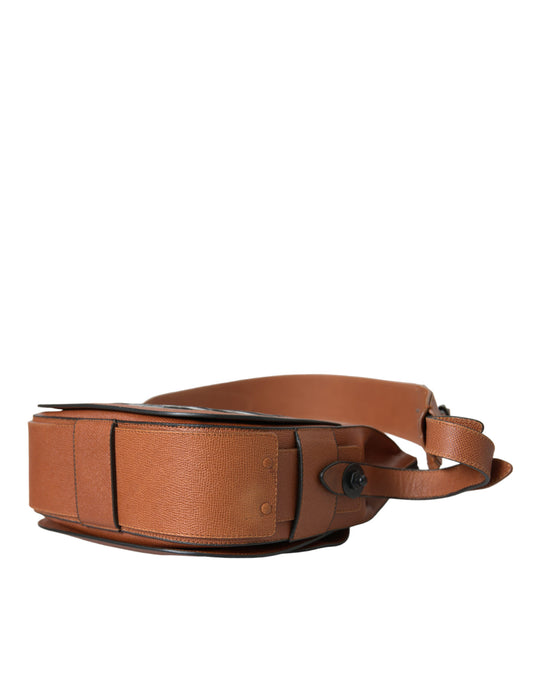 Brown leather belt with silver buckle