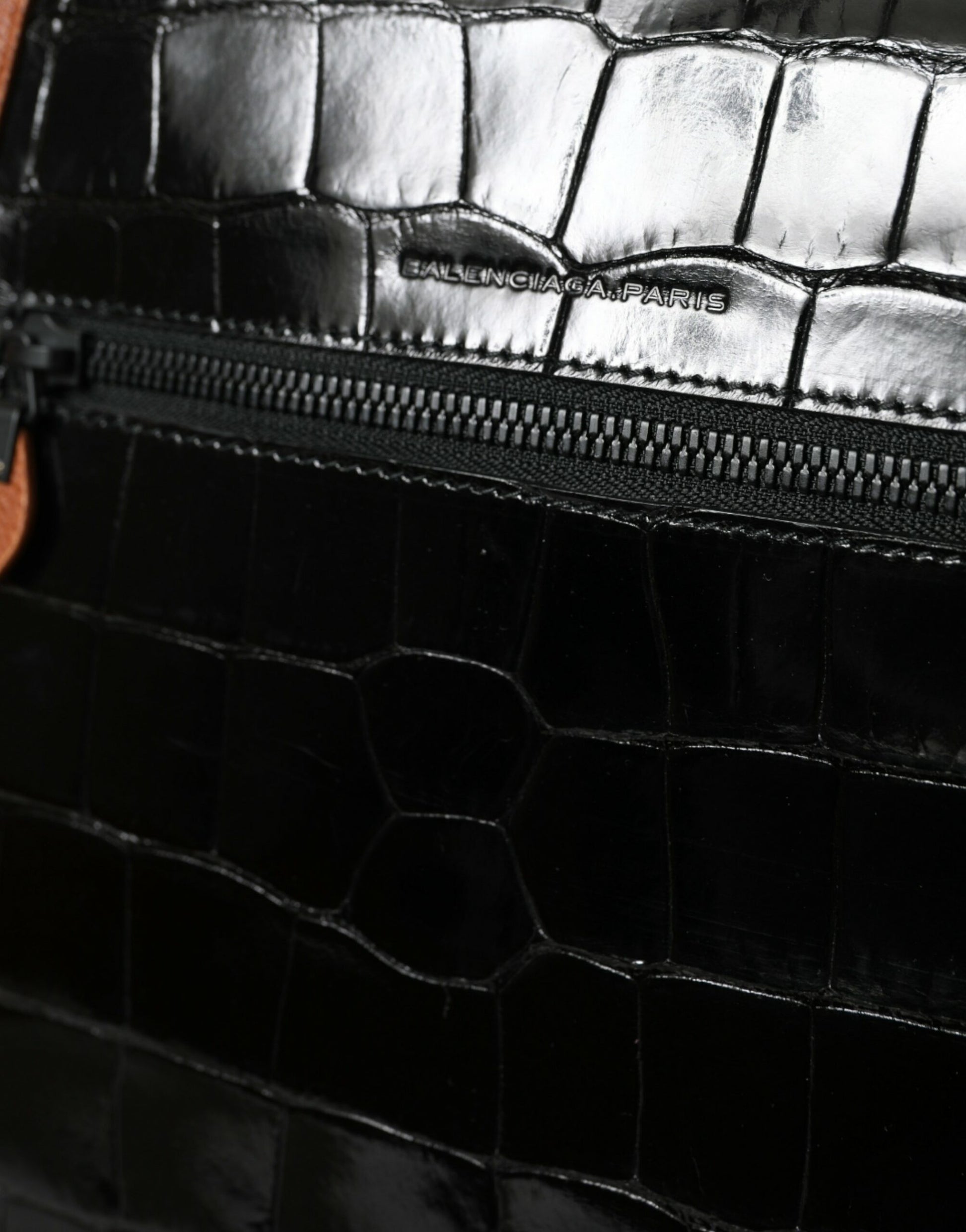 Black leather wallet with zippered compartment