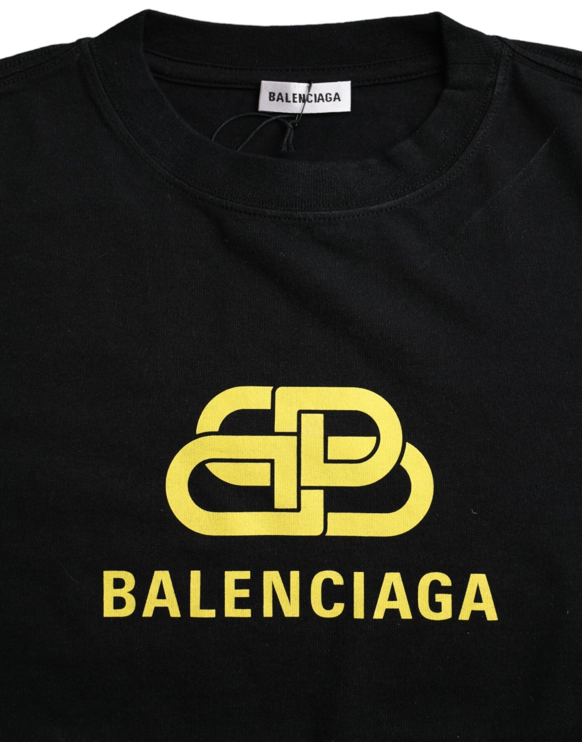 Black t-shirt with yellow logo