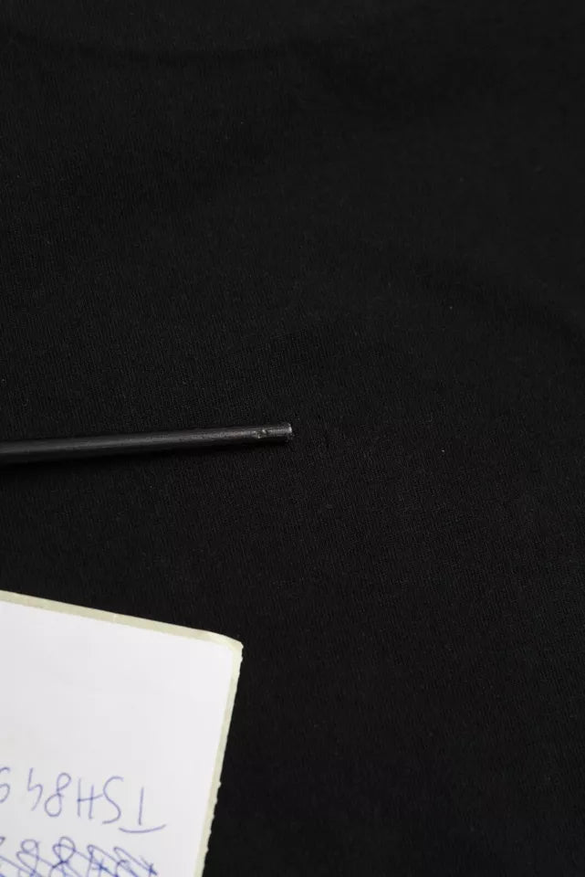 Black pen on black surface