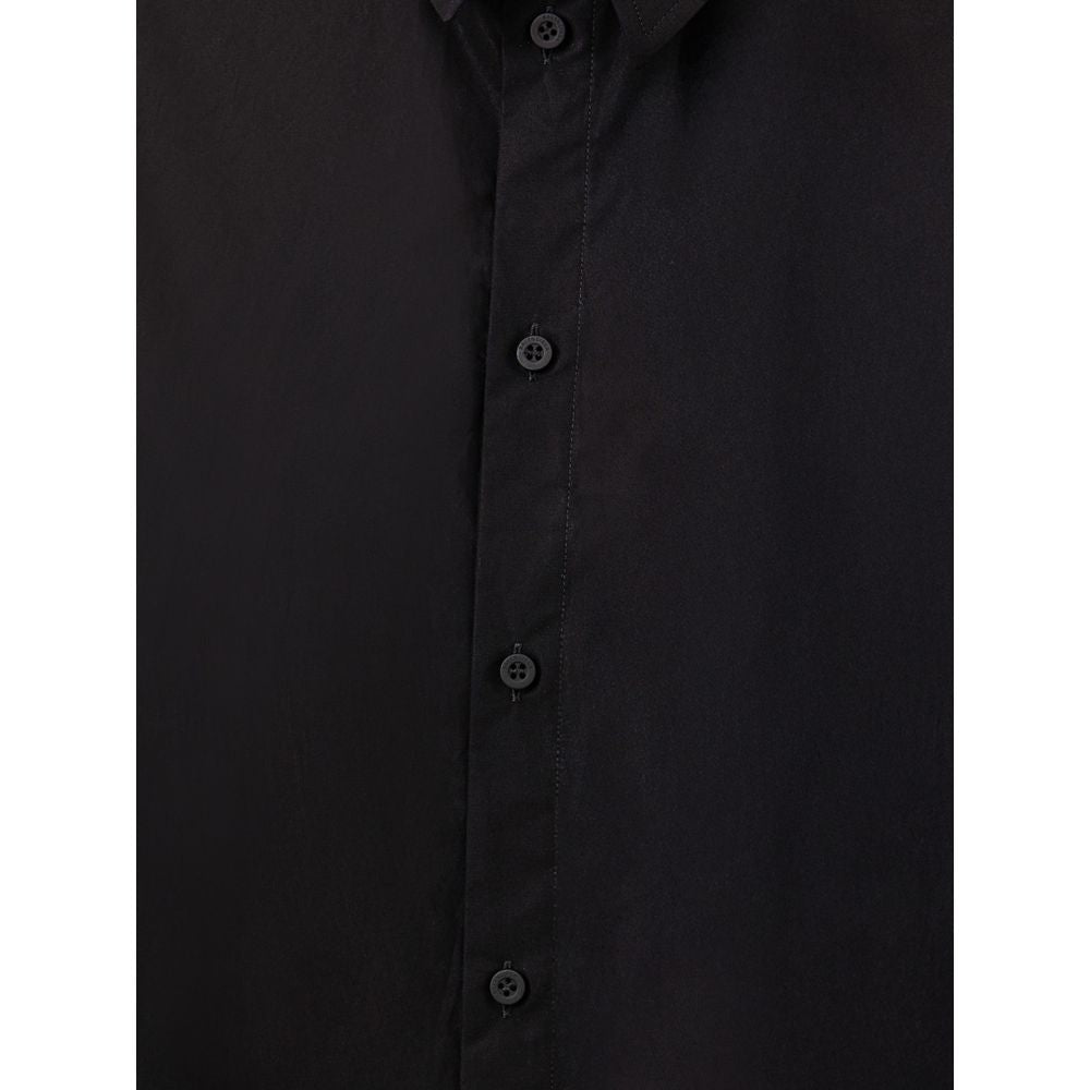 A black cotton long dress with buttons down front