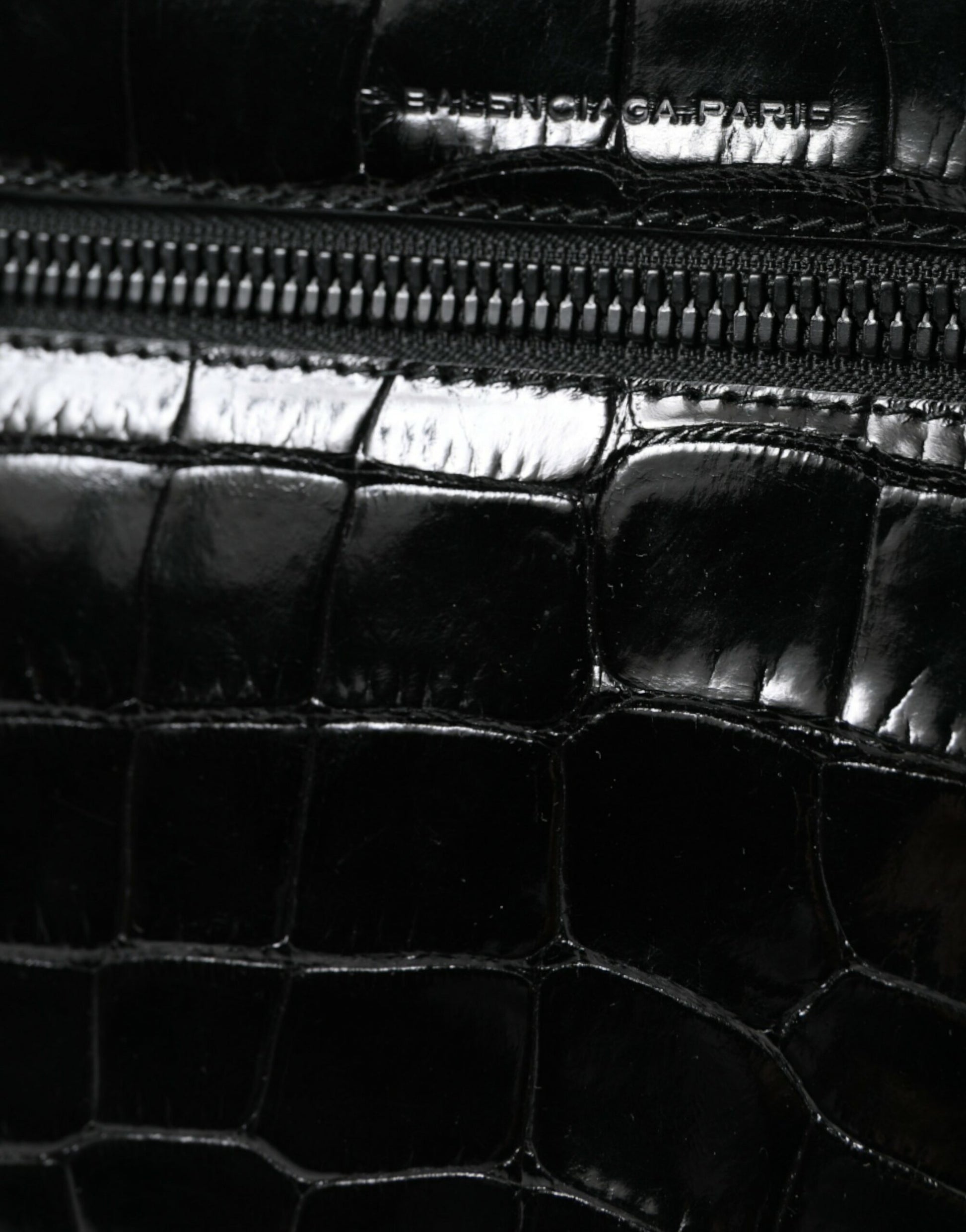 Black leather wallet with zipper closure