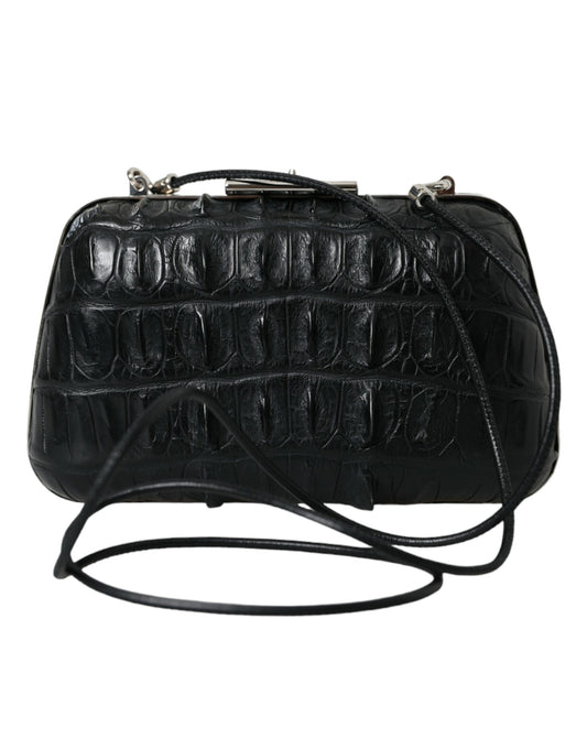 Black leather handbag with metal hardware