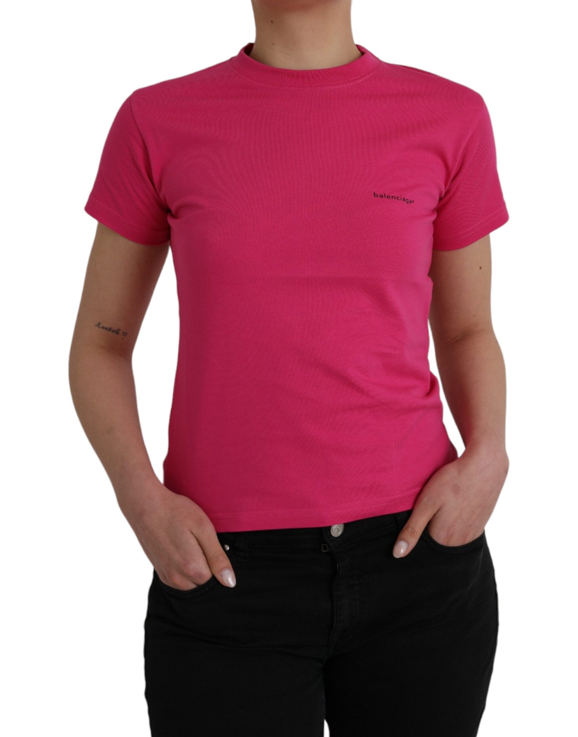 Pink short sleeve shirt on a person