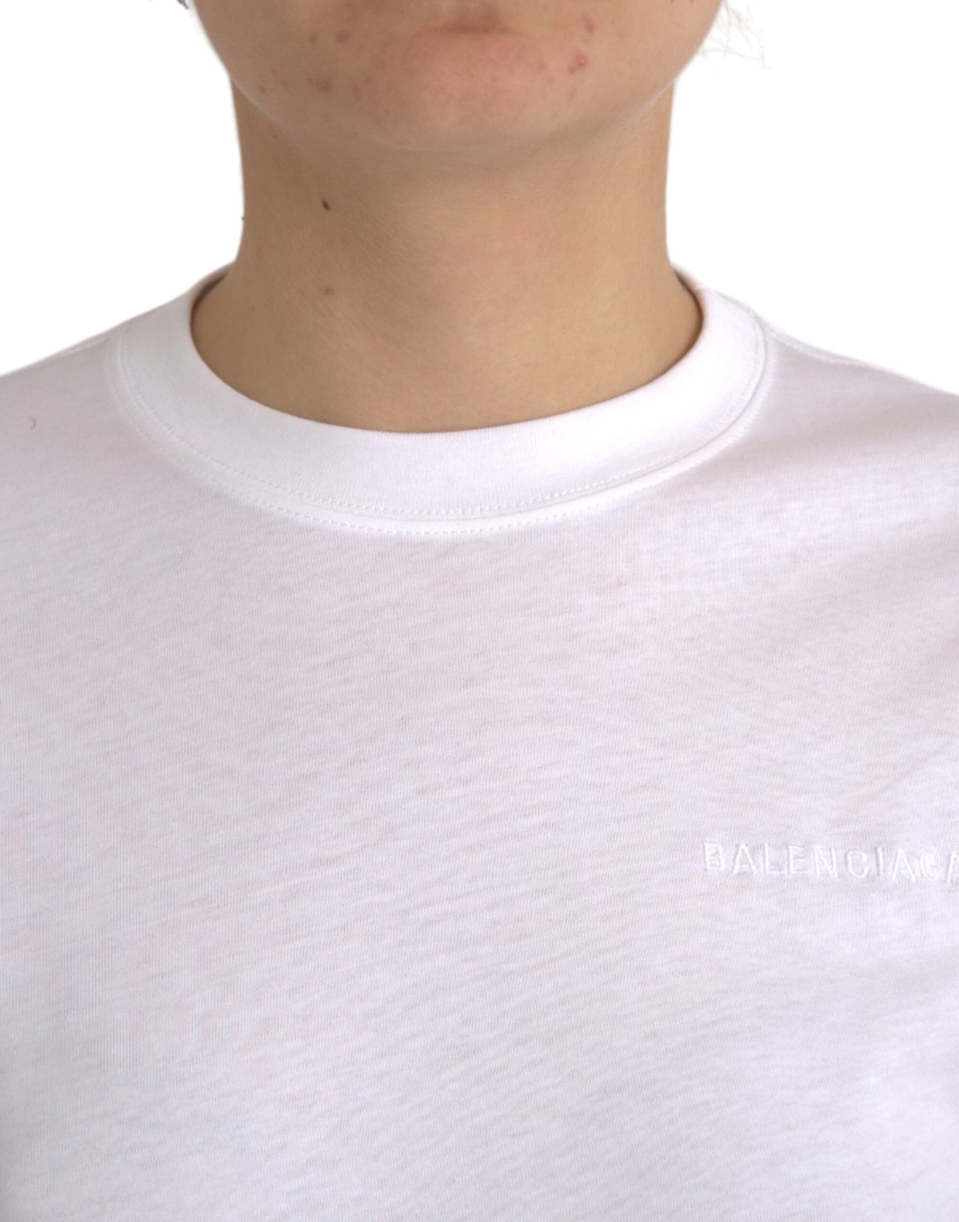 A white cotton crew neck t-shirt with short sleeves