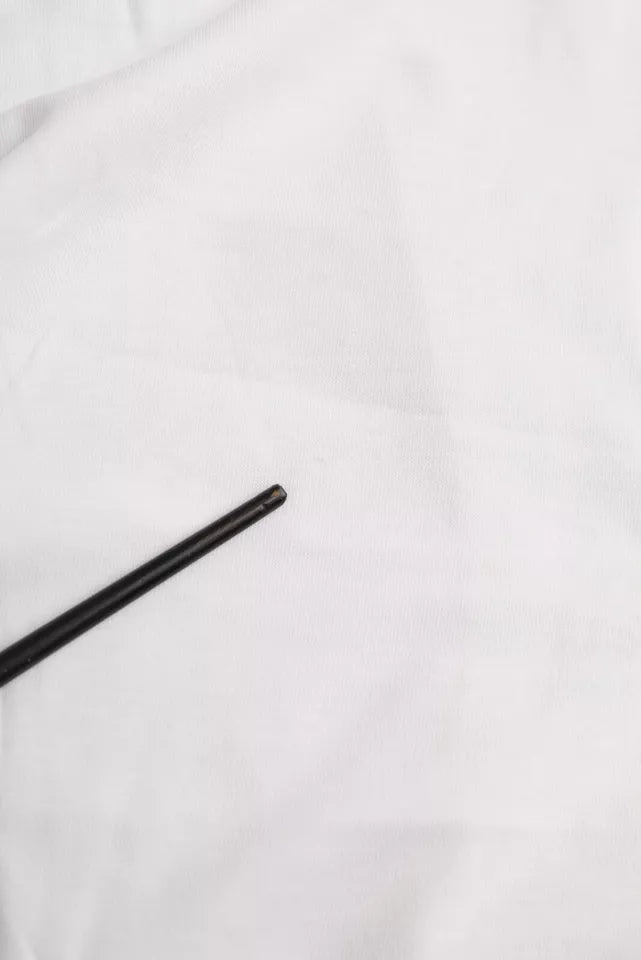 Black pen on white cloth