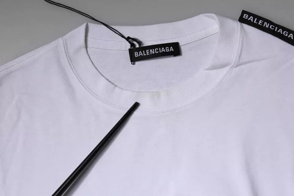 White t-shirt on hanger with black label