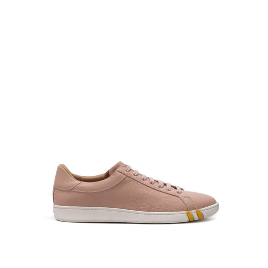 Pink sneaker with white sole and yellow stripe on side