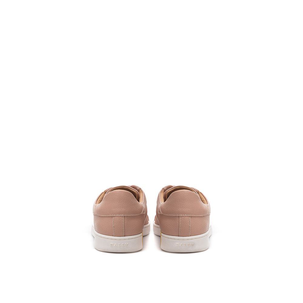 Pair of pink sneakers with white soles and laces