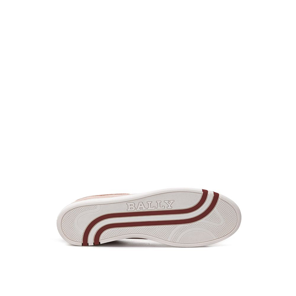 A single pink leather low top sneaker with a white sole and red stripe detailing