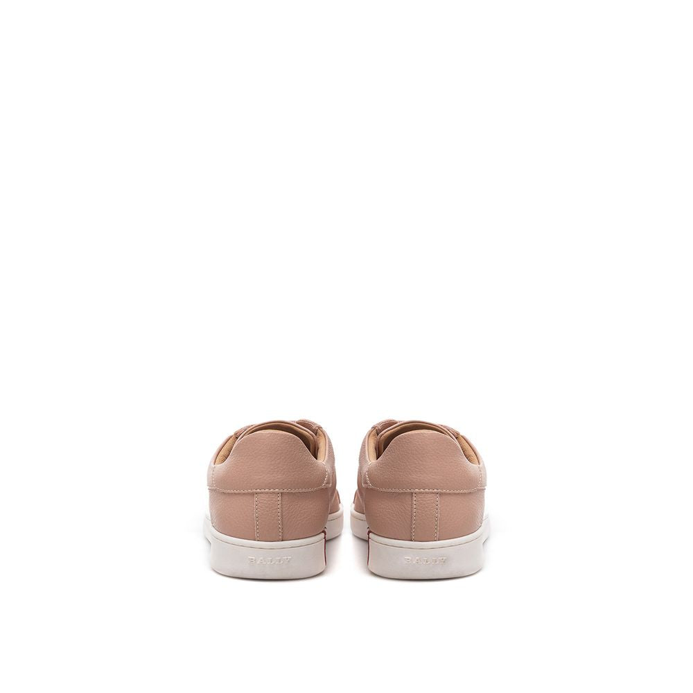 A pair of pink leather low top sneakers with white laces