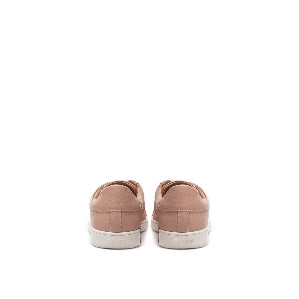 Pair of brown sneakers with white soles and laces