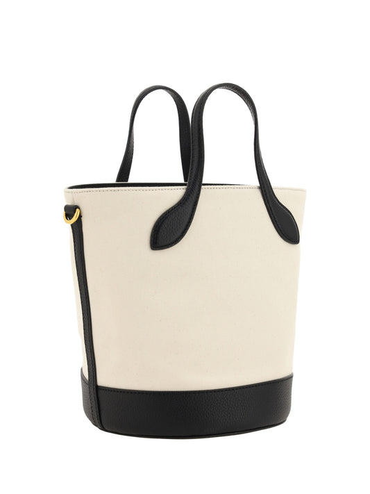 Large beige tote bag with black trim and handles
