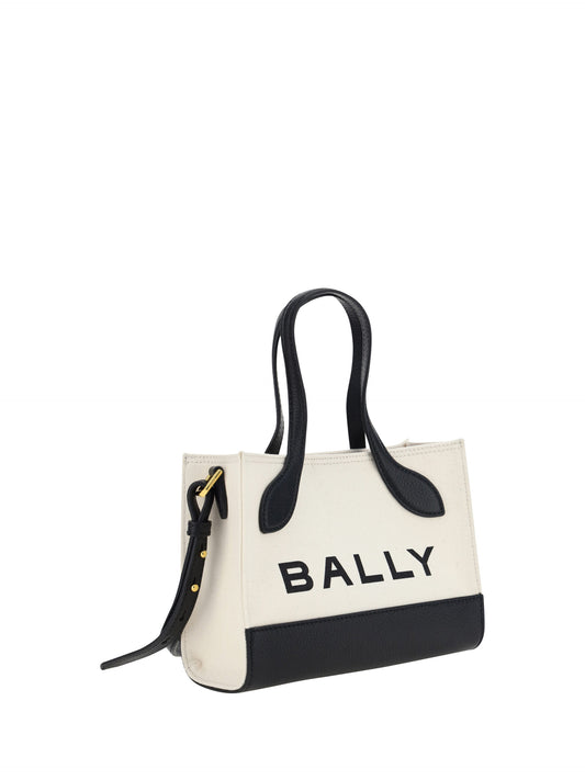 Large tote bag with black straps and a white body featuring black stripes and the word "Bally" in black letters