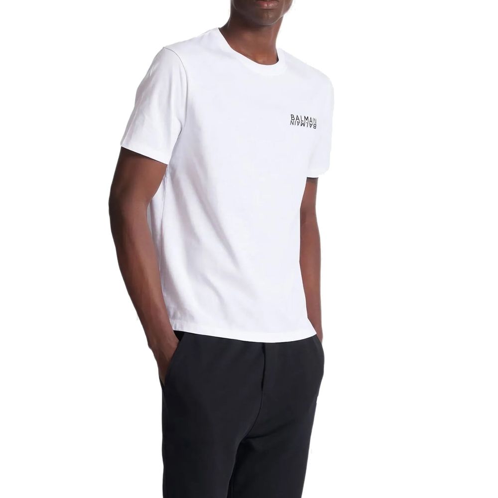 A mannequin wearing a white cotton t-shirt with black text on it