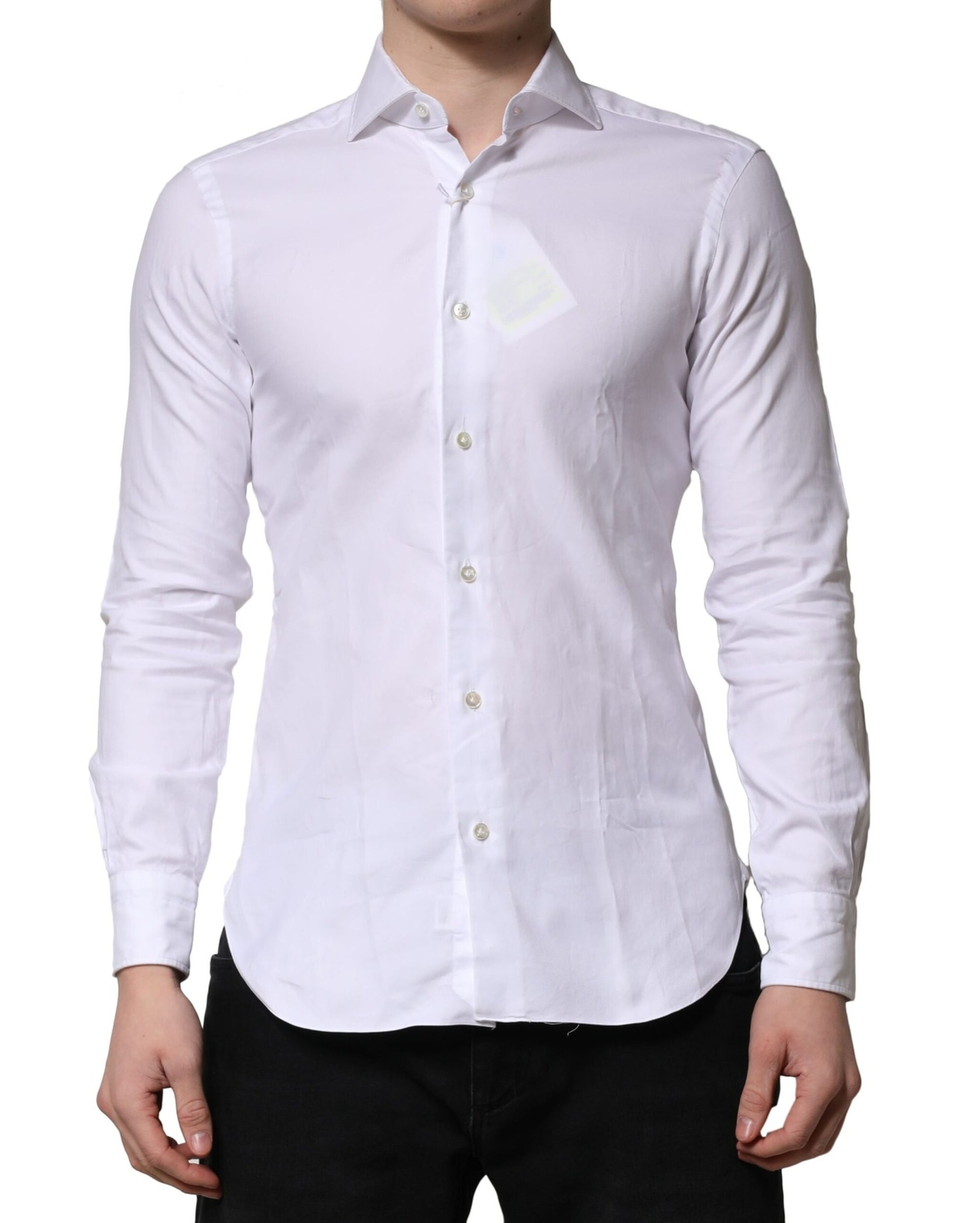 A long sleeve white collared dress shirt with a button-up front