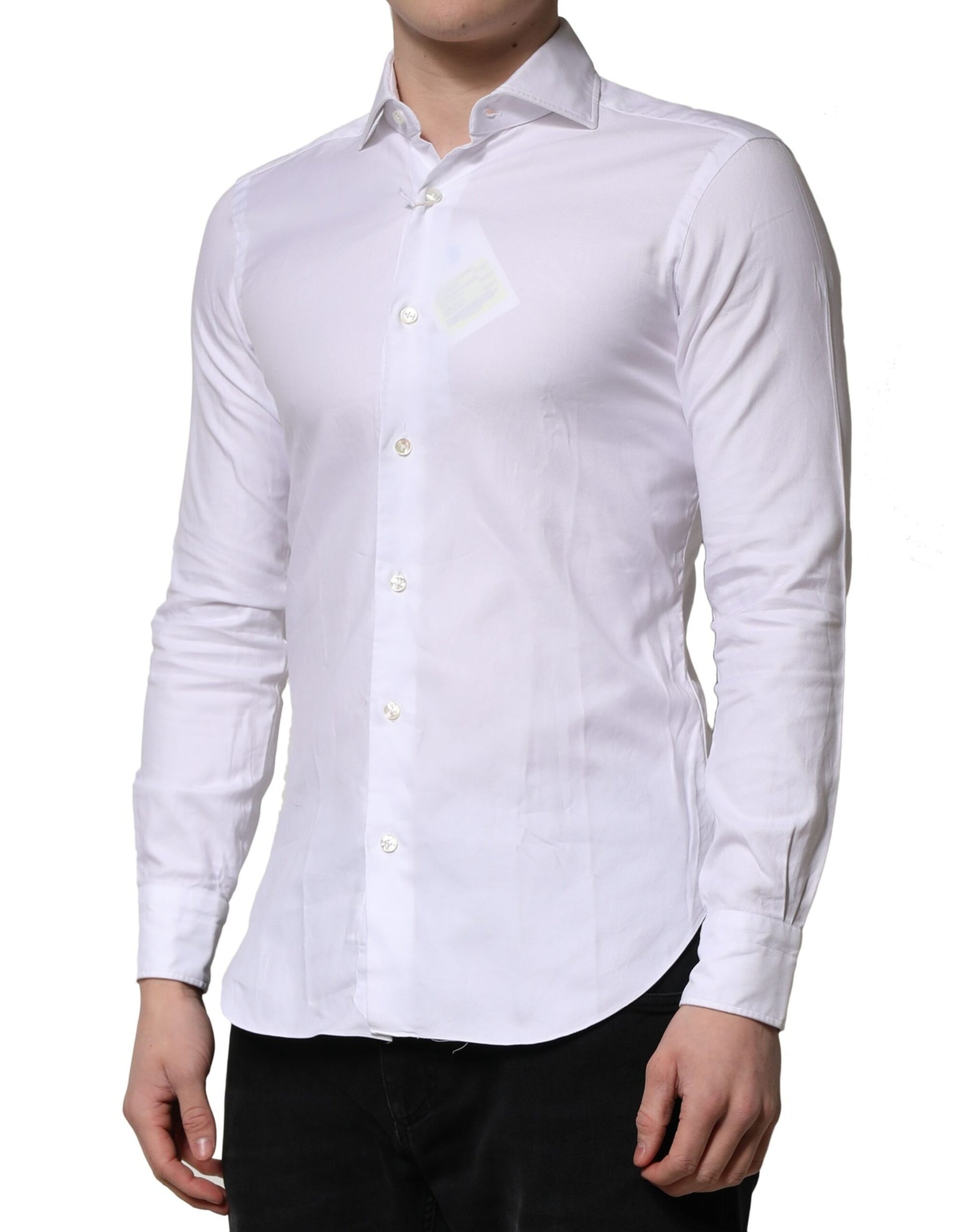 A long sleeve white collared dress shirt with a button-up front