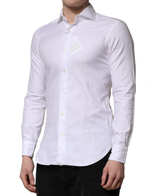 A long sleeve white collared dress shirt with a button-up front