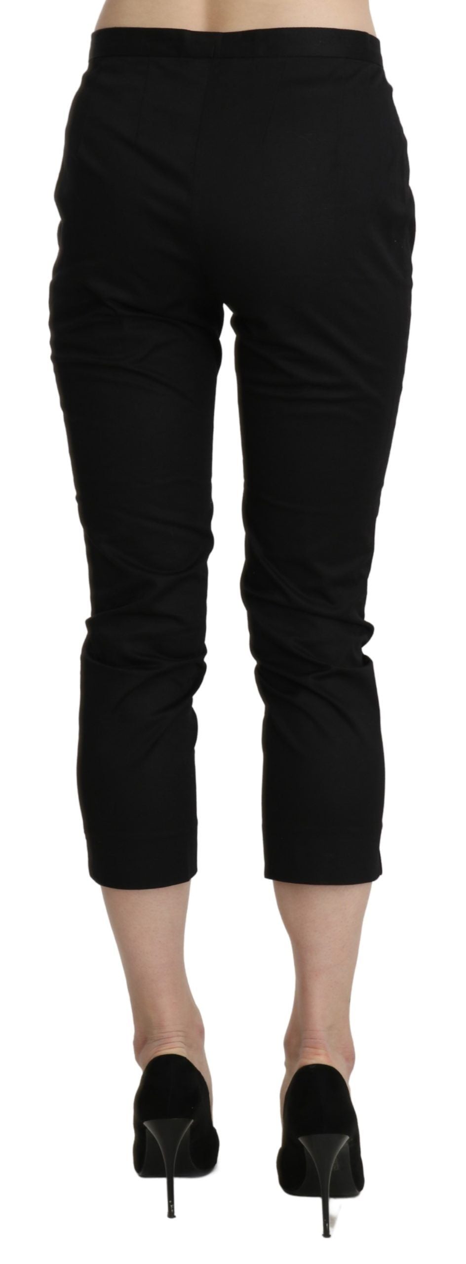 A pair of black high waist skinny cropped dress trousers