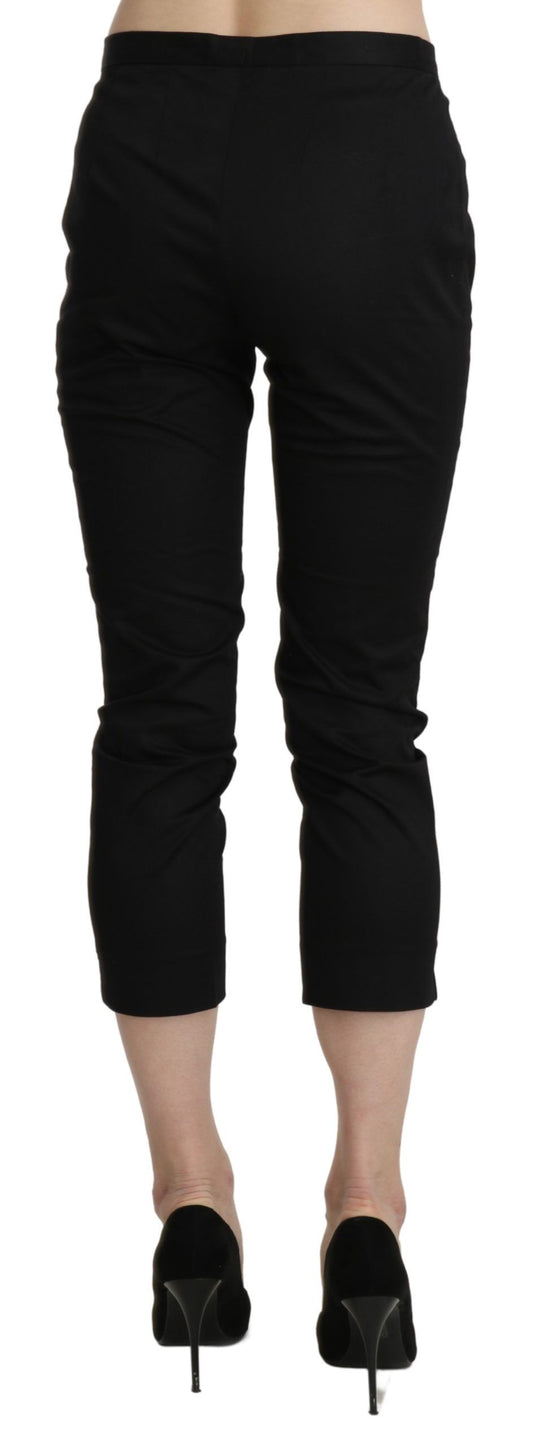 A pair of black high waist skinny cropped dress trousers